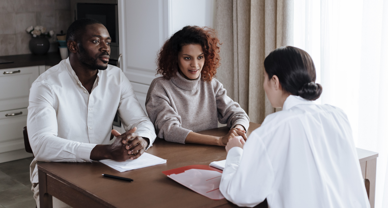 A Social Worker Talking to a Couple