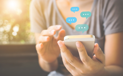 Woman using her smartphone to send messages